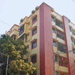 Residential tower facade at Pragati Dham by BS Group Elderly Family Members